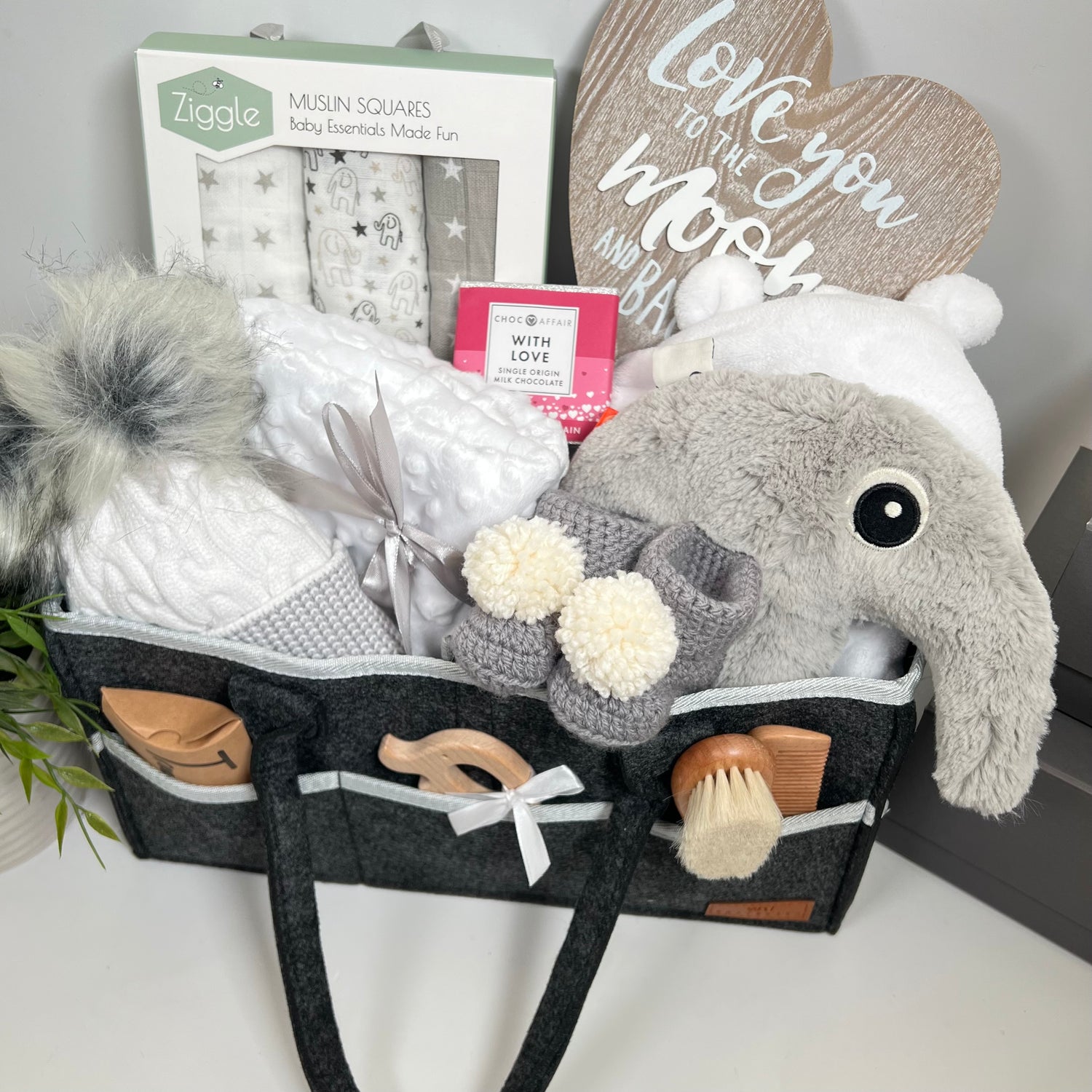 new baby gift hamper full of new baby essentials with an elephant theme