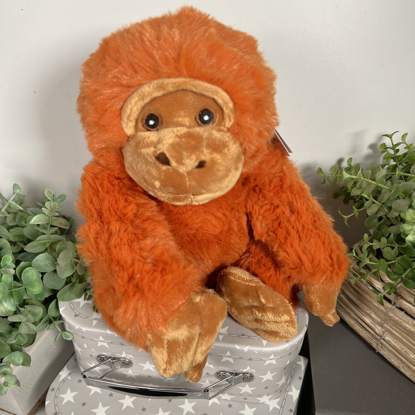 Cuddly eco plush orangutang baby toy.