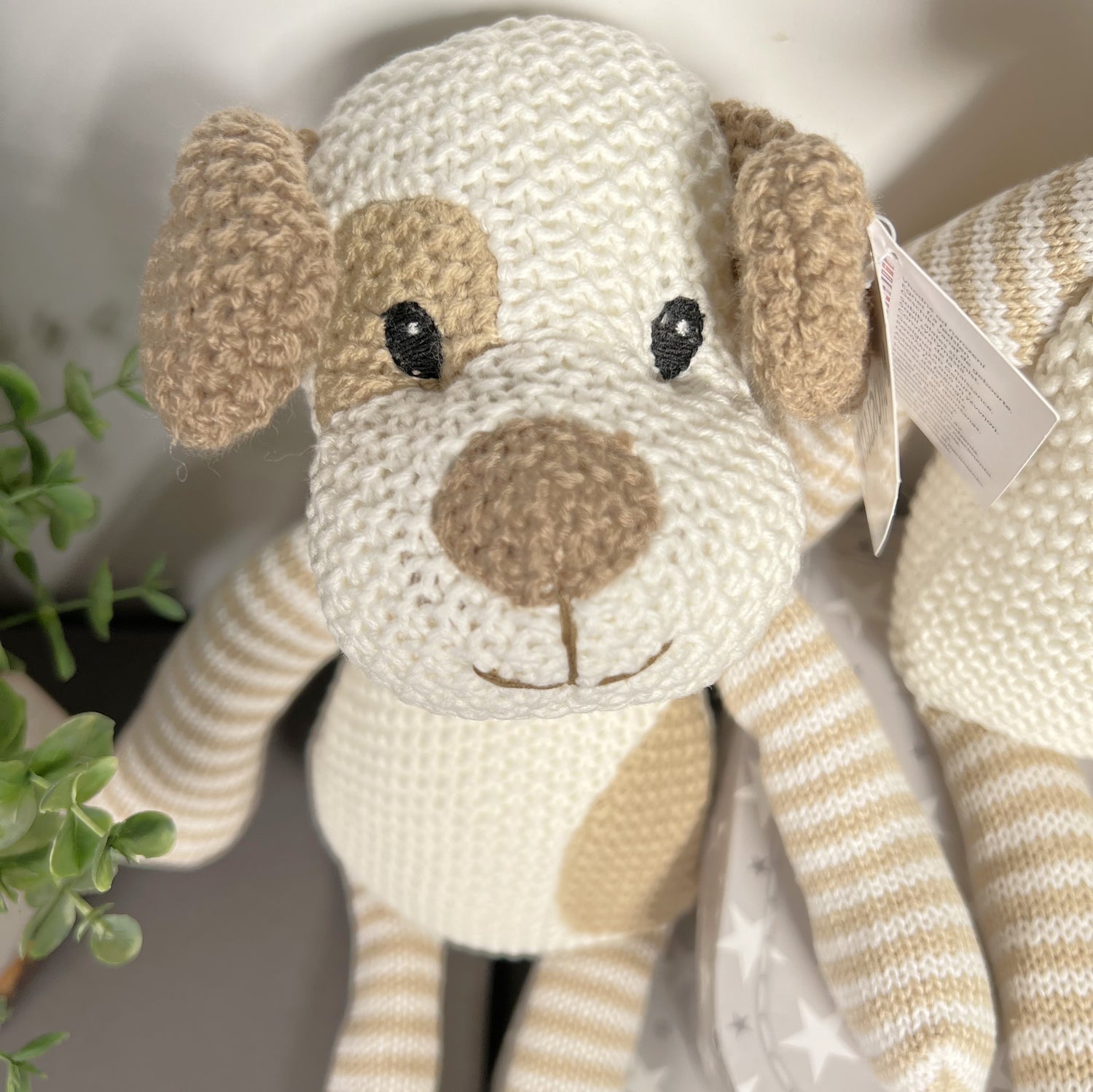 Knitted soft baby toy puppy